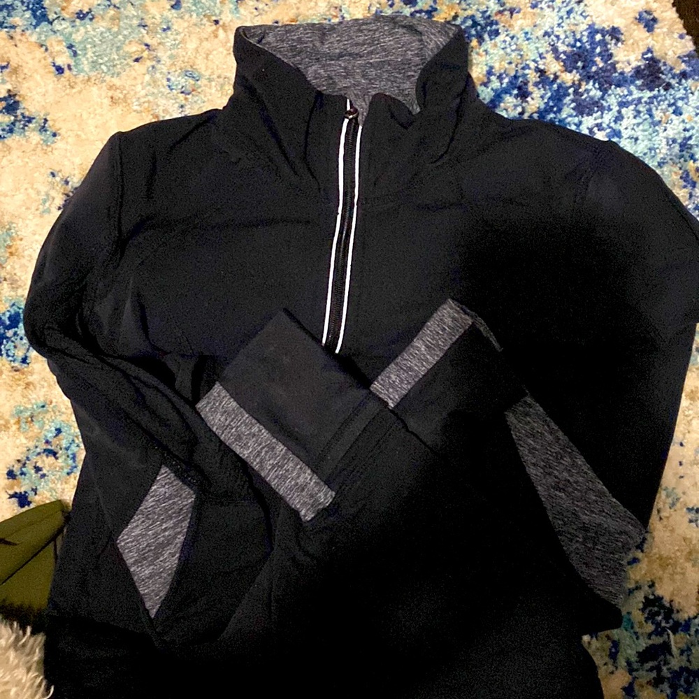 Black with grey detail 1/4 zip. Lulu lemon-great condition